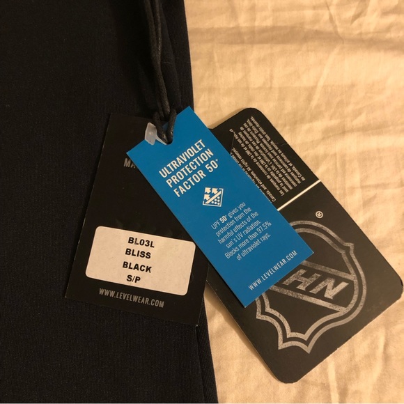 NHL Women’s Anaheim Ducks Hockey Polo Tee - Picture 4 of 6